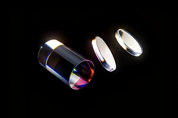 Optical element illustration showing a cylindrical body and separate round surfaces